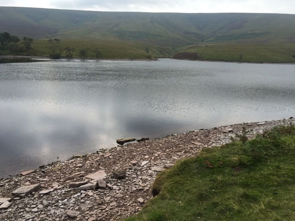 Scenic reservoir and mountain backdrop at Grwyne Fawr Dam, Black Mountains, Wales.