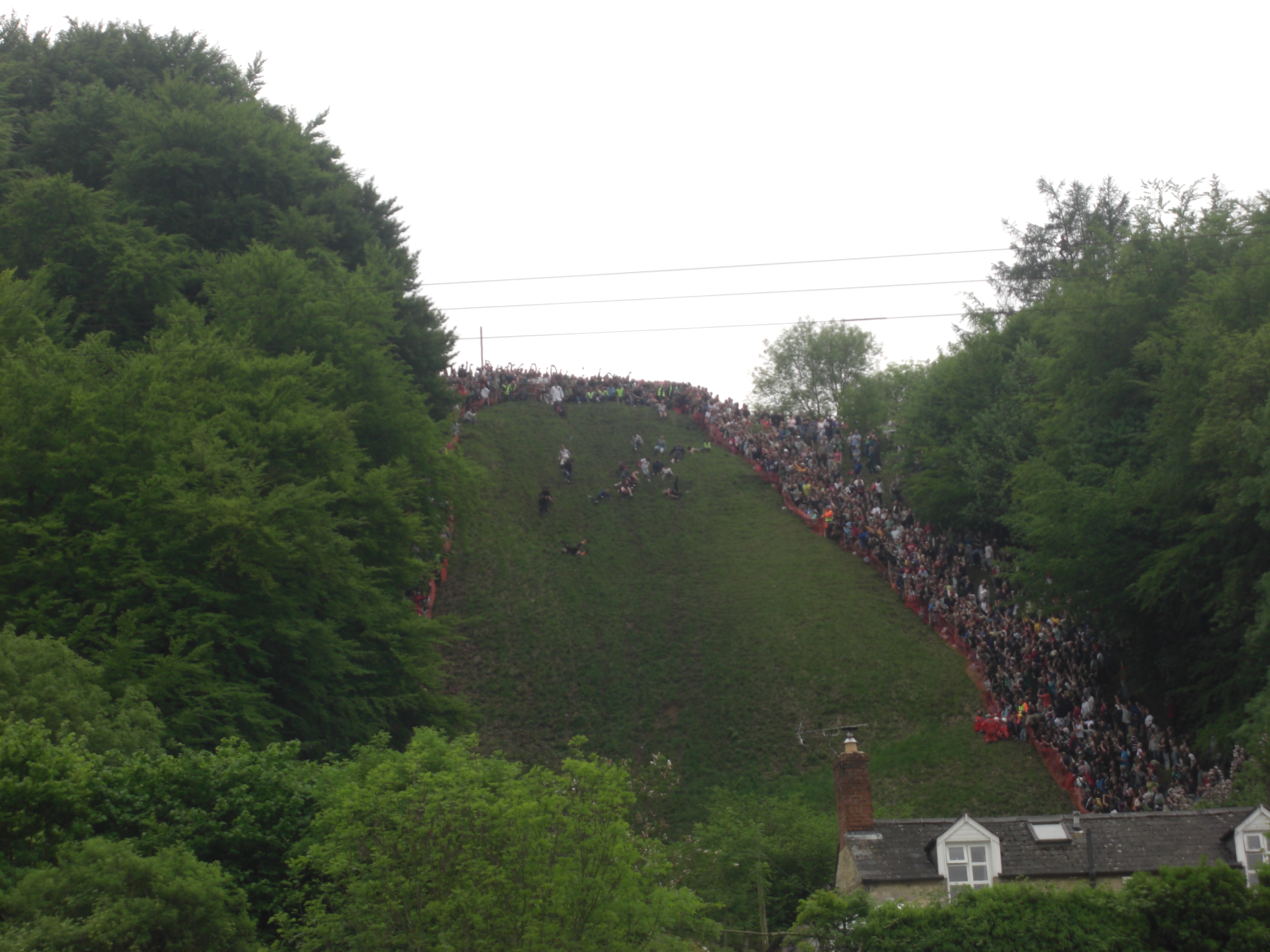 What is the Coopers Hill Cheese Rolling in Gloucestershire?