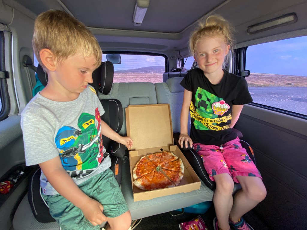 kids in bongo with vegan pizza from st agnes takeaway
