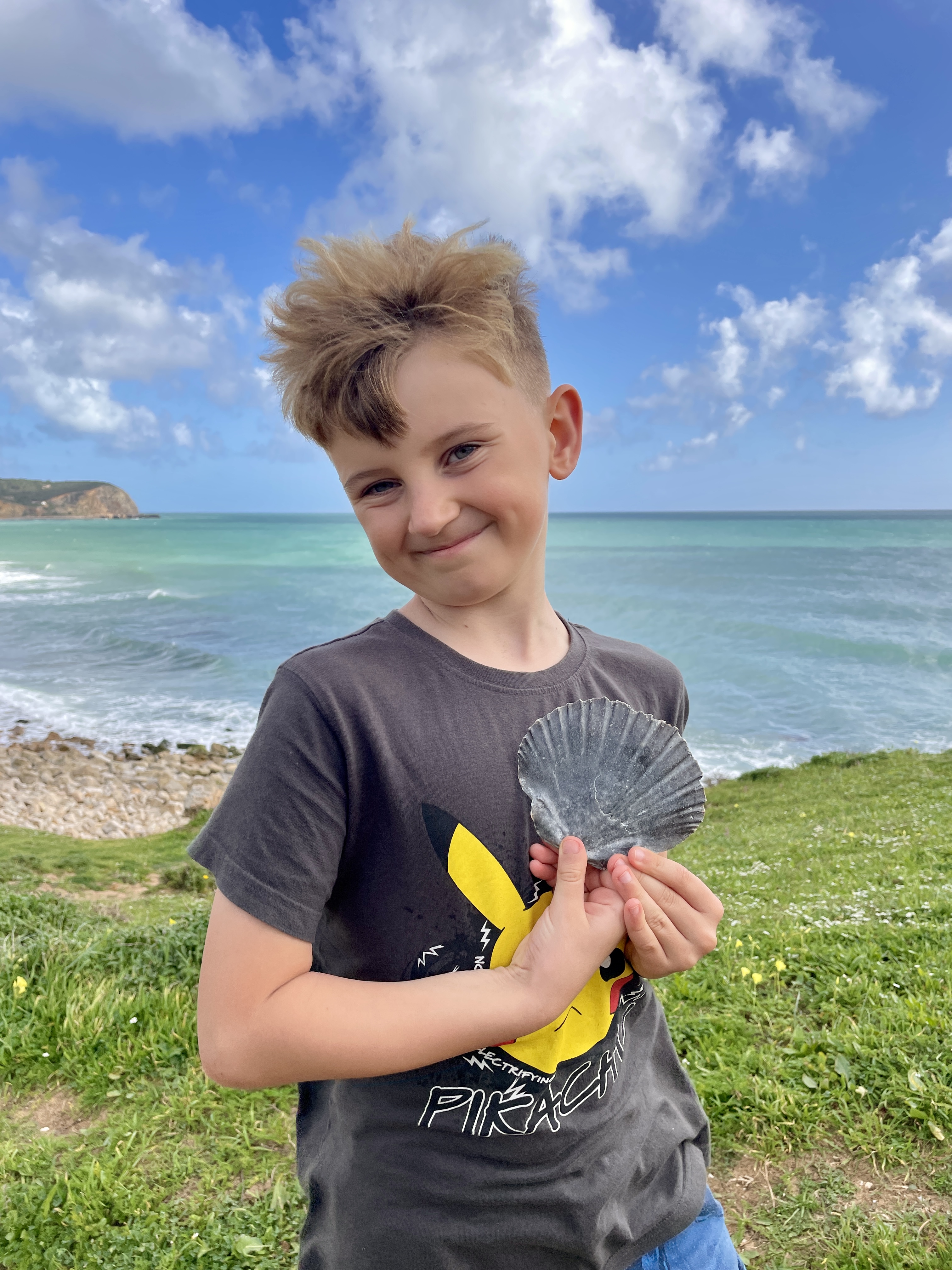 Finding shells at Praia da Boca do Rio