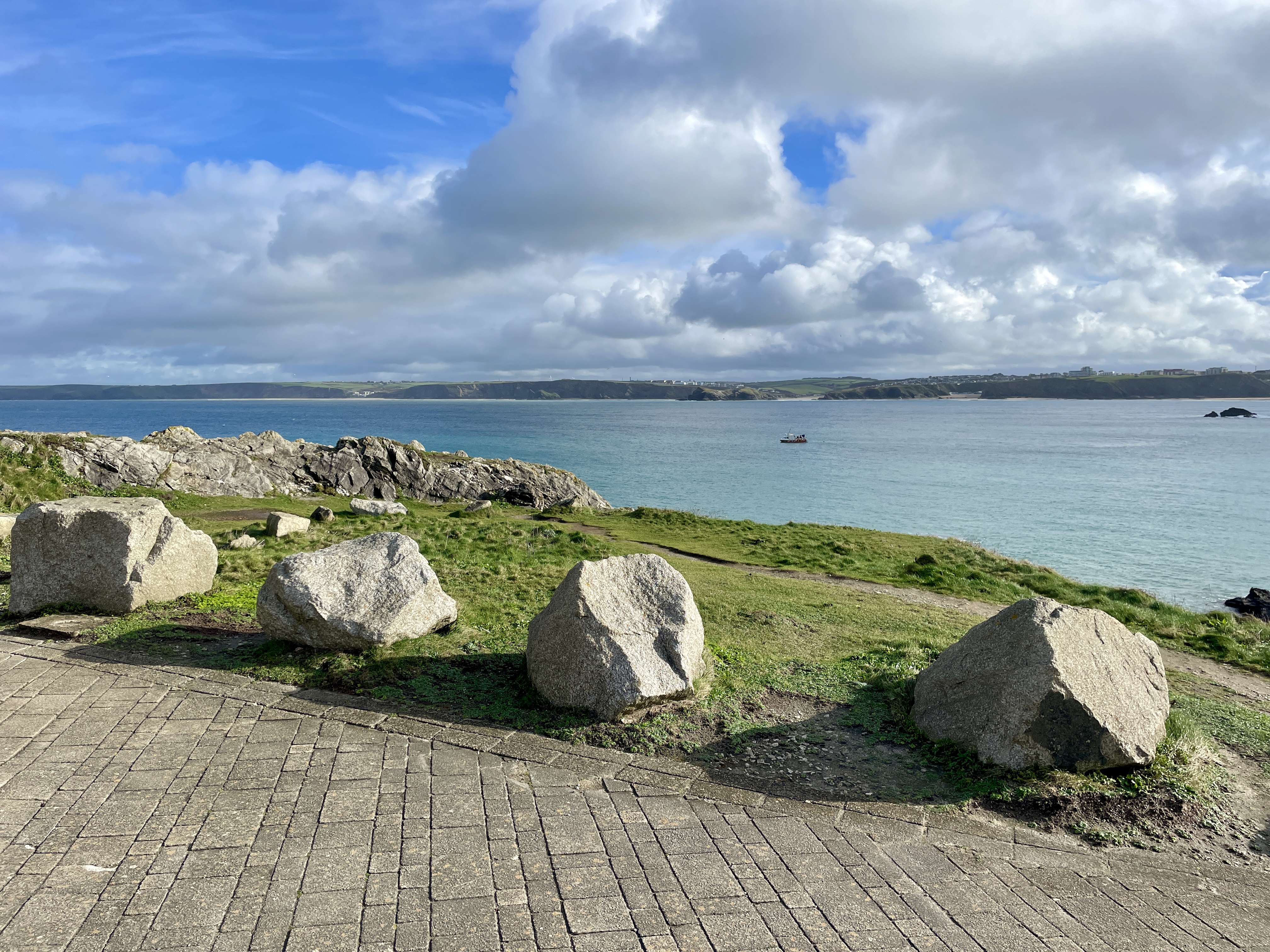 Views across Newquay Bay behind Little Fistral beach