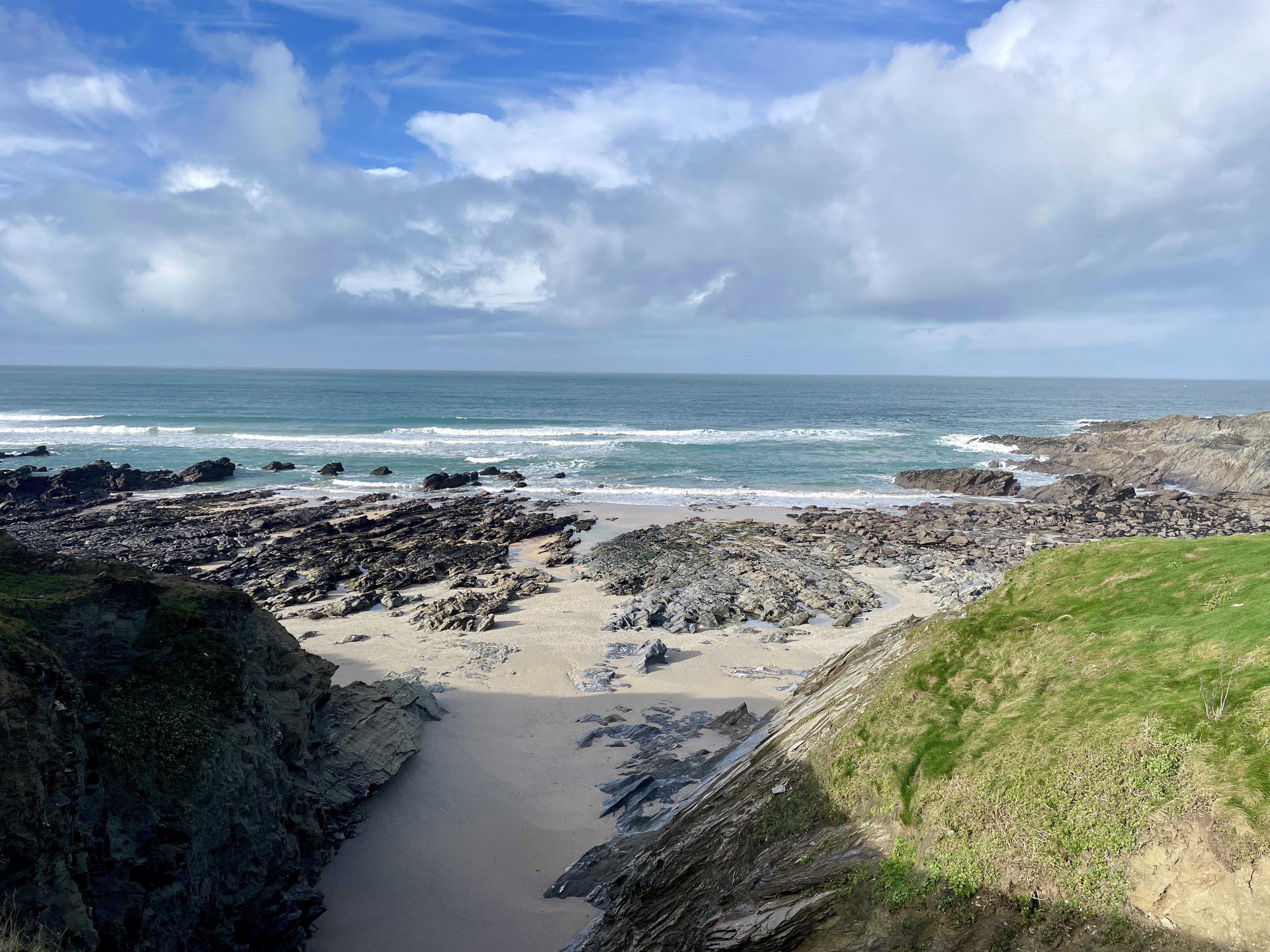 Rocky left side of Little Fistral beach in Newquay at low tide