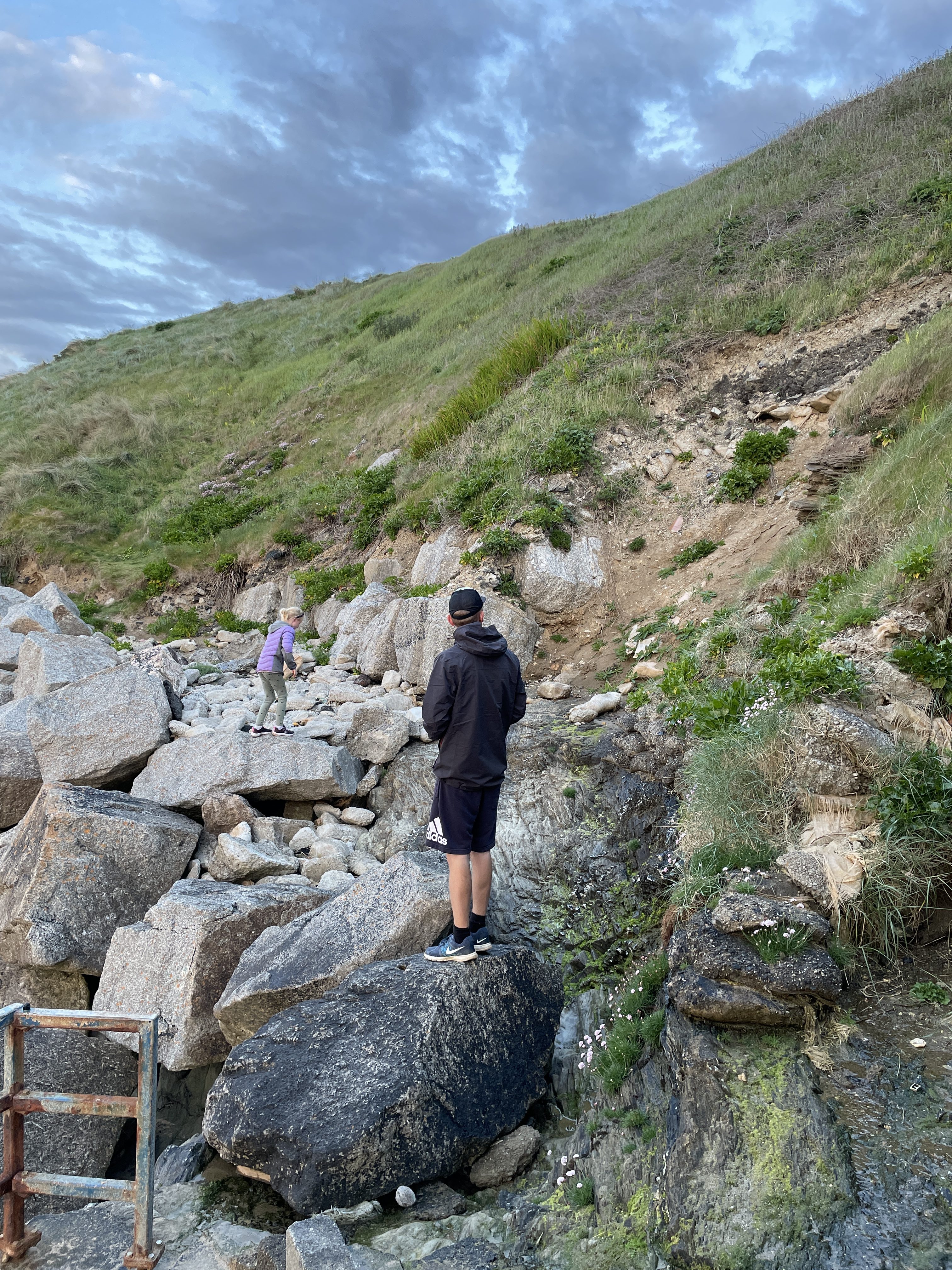 Exploring the rocks at Fistral South