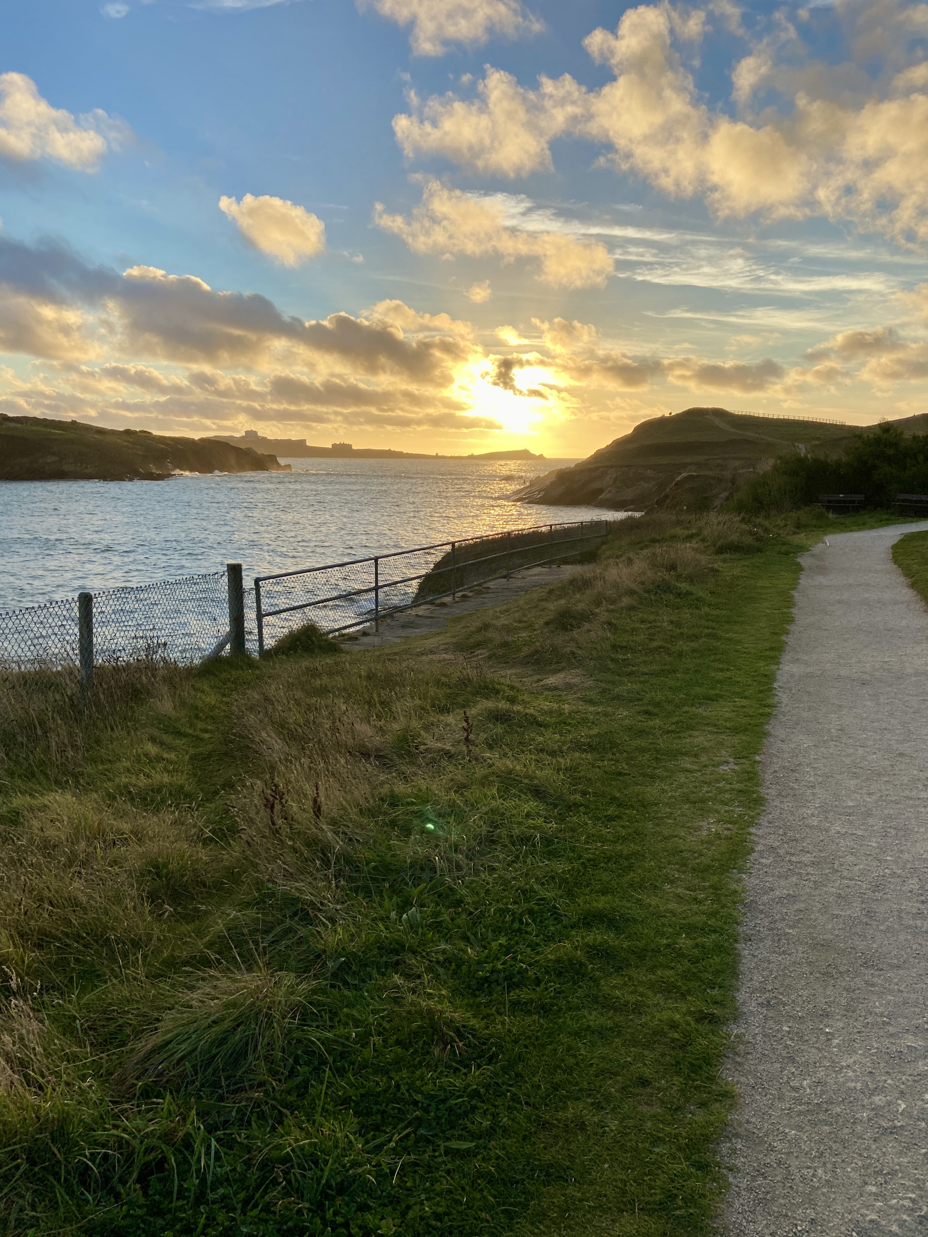 Sunset from path along trevelgue headland in porth newquay