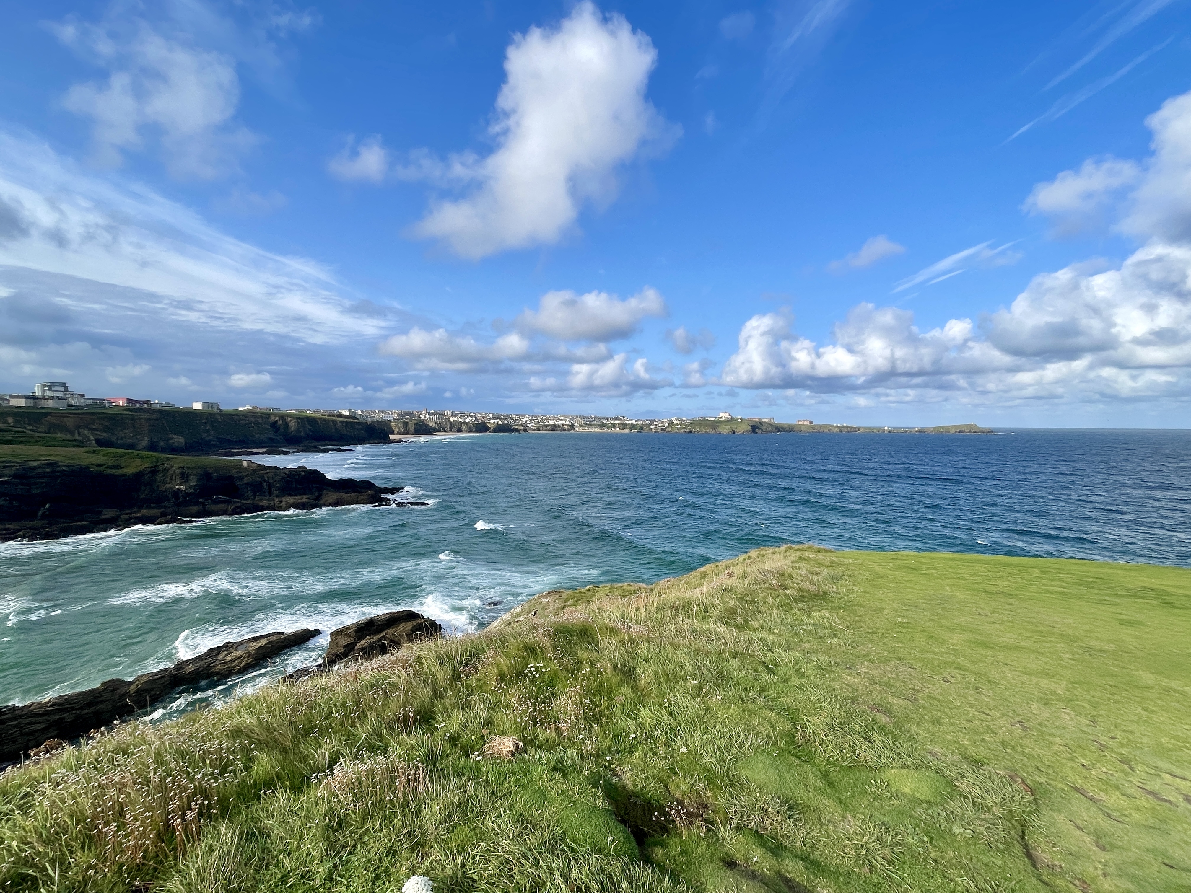 Wave watching and panoramic views across Newquay Bay from Trevelgue Head in Porth.