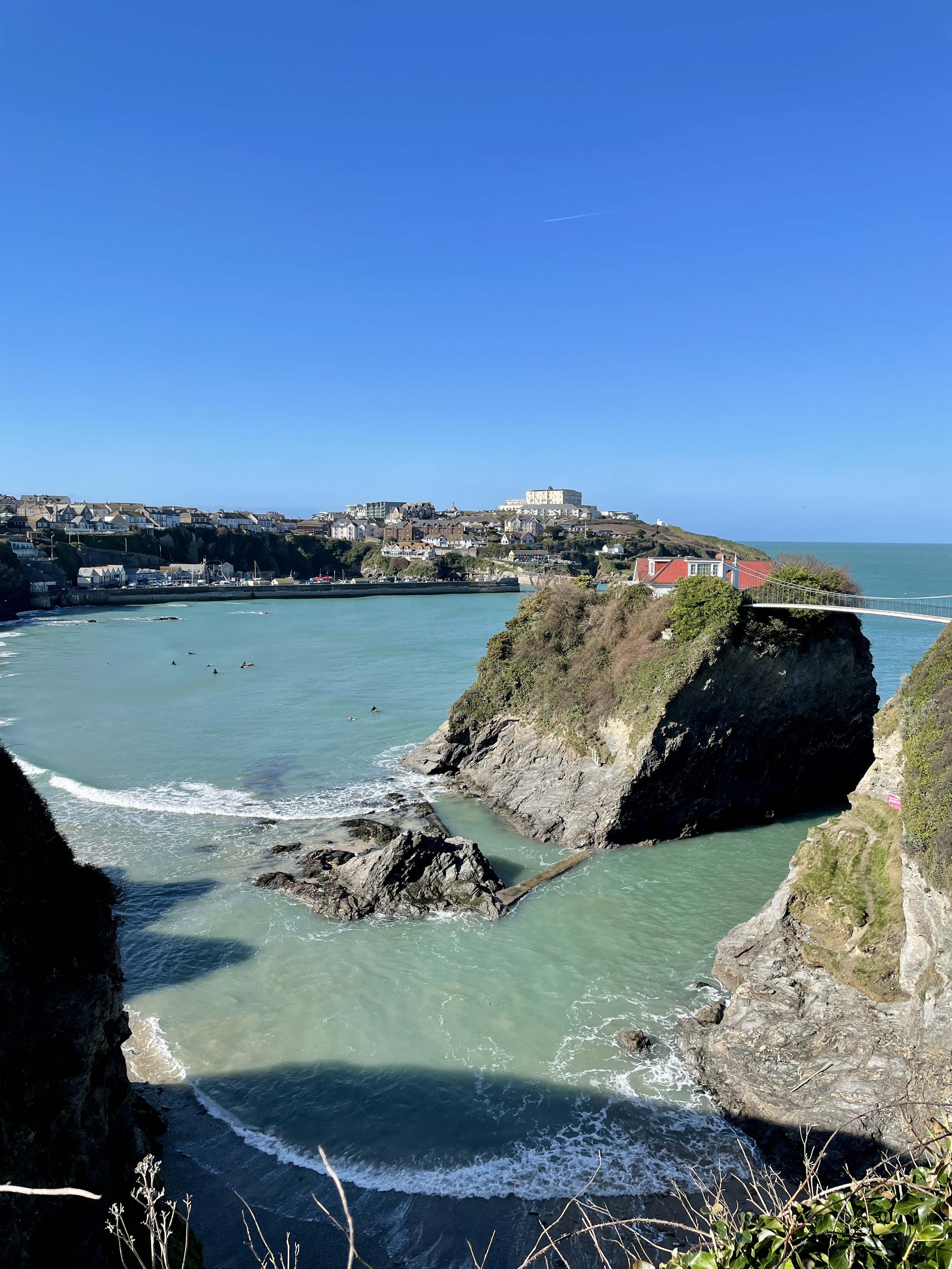 Views from above Towan Beach at high tide