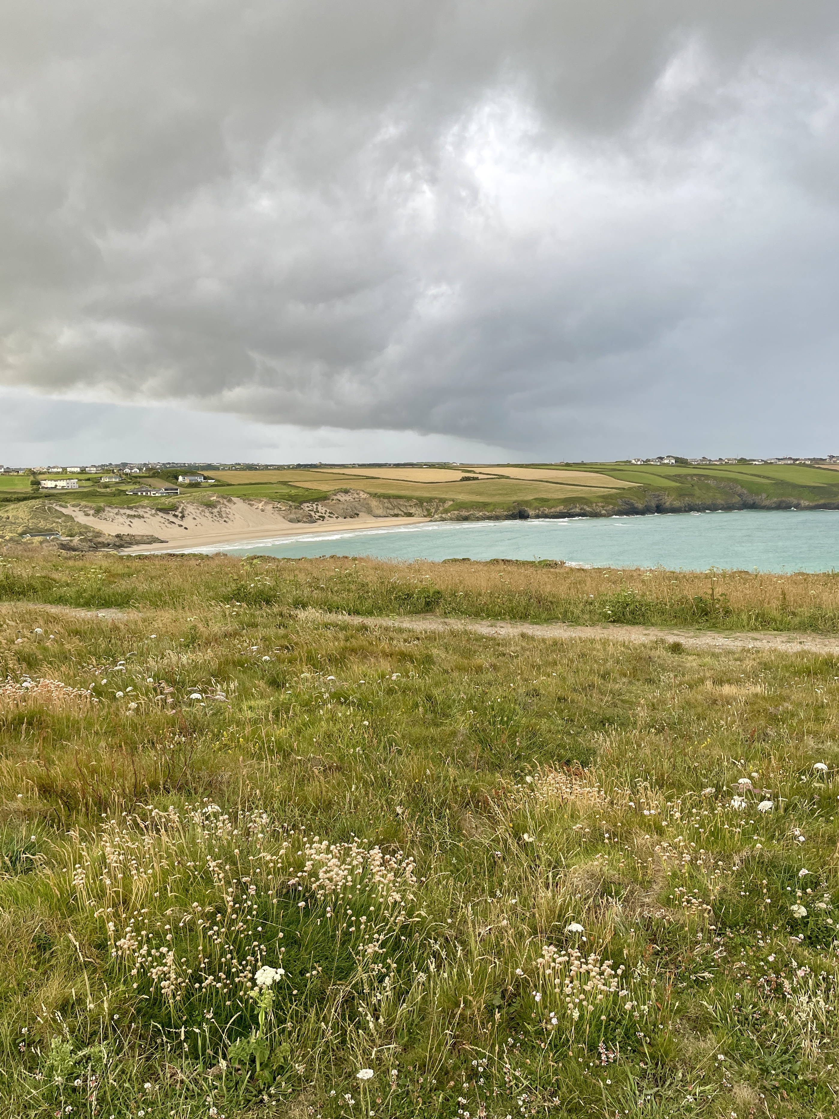 Crantock sand dunes at high tide viewed from Pentire Headland