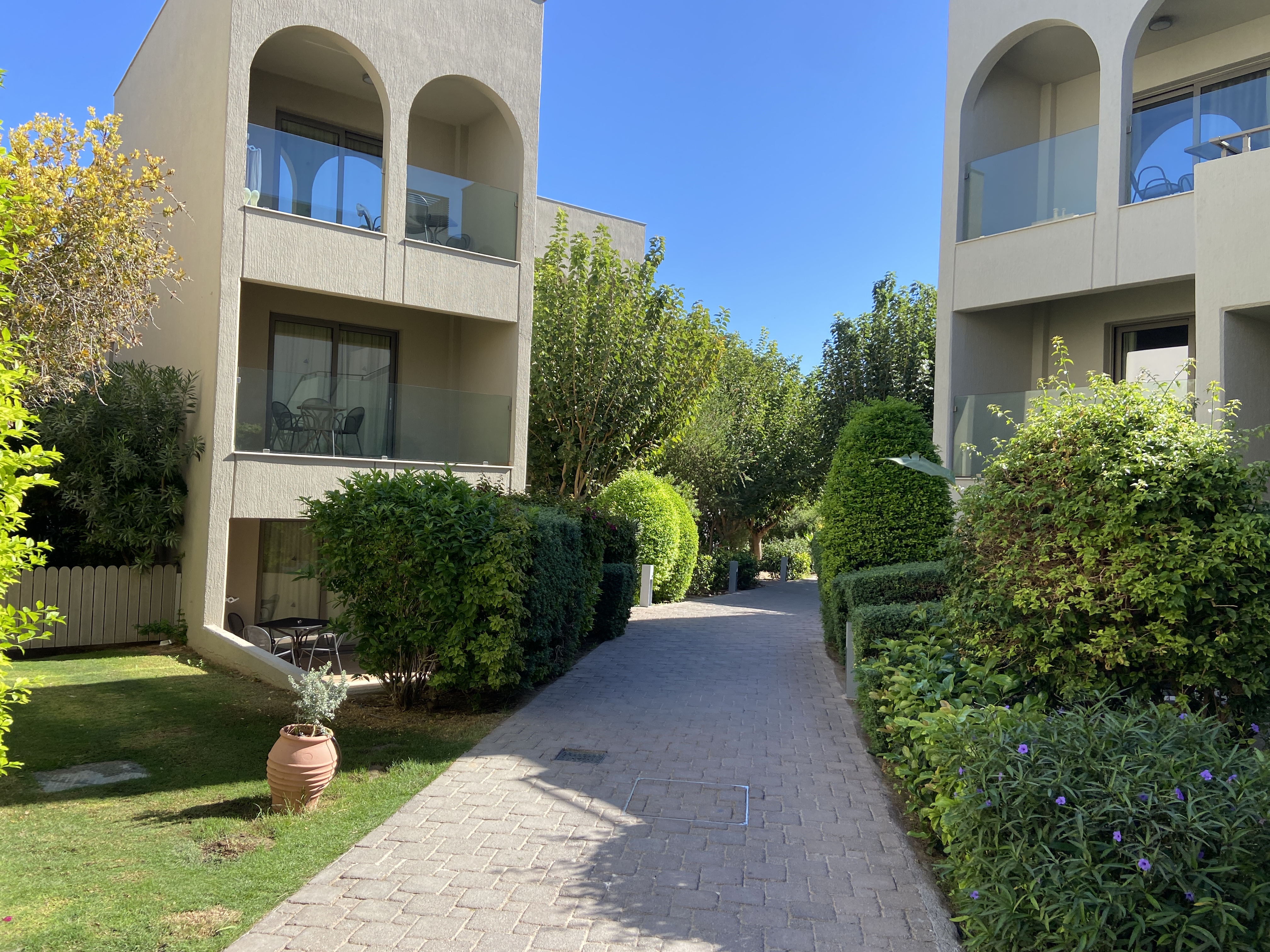 Grounds and types of accommodation buildings at atlantica aegean blue hotel in Kolymbia in rhodes greece