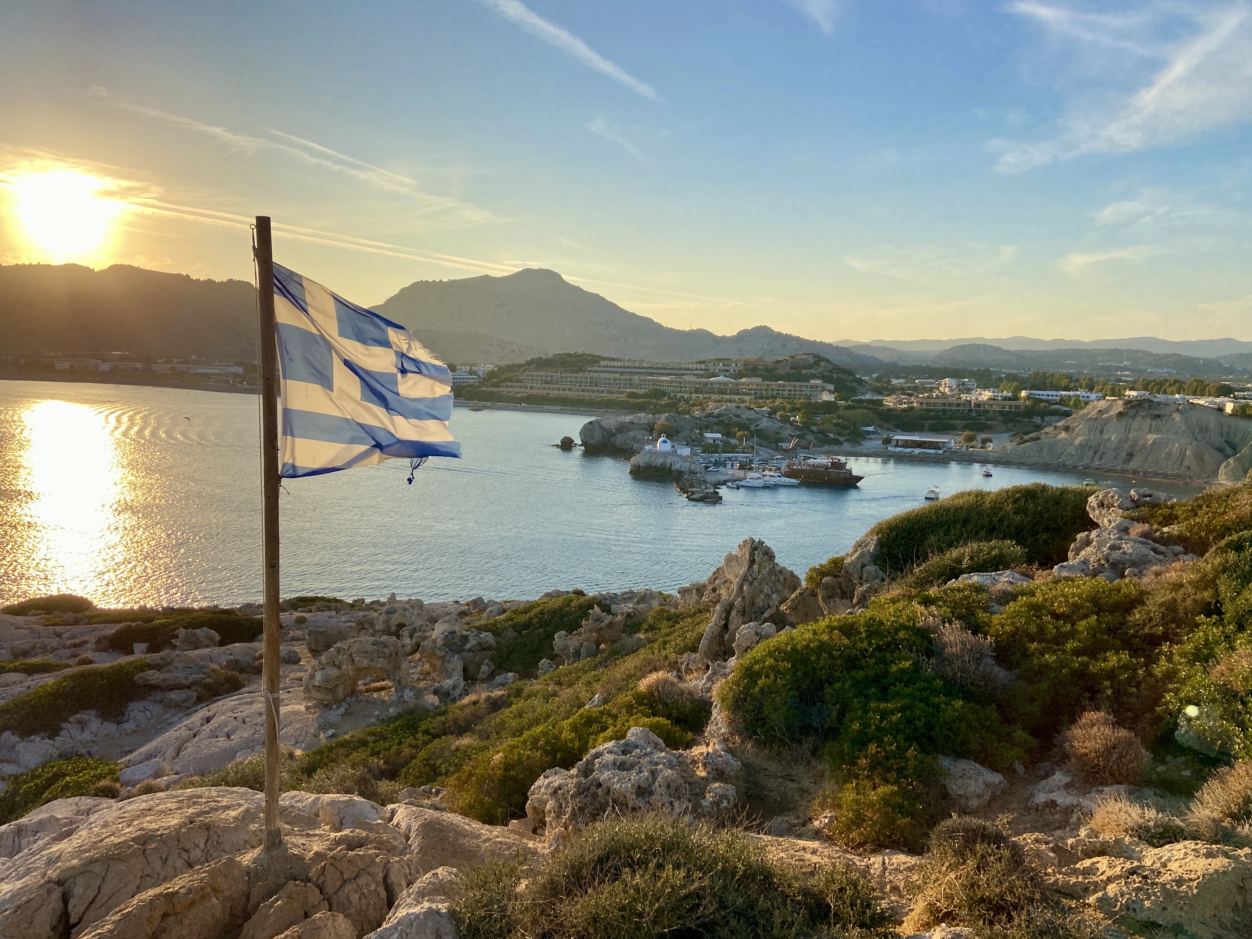 Sunset over Kolymbia Harbour and Tsambika Mountains from Kolymbia Flag Hill