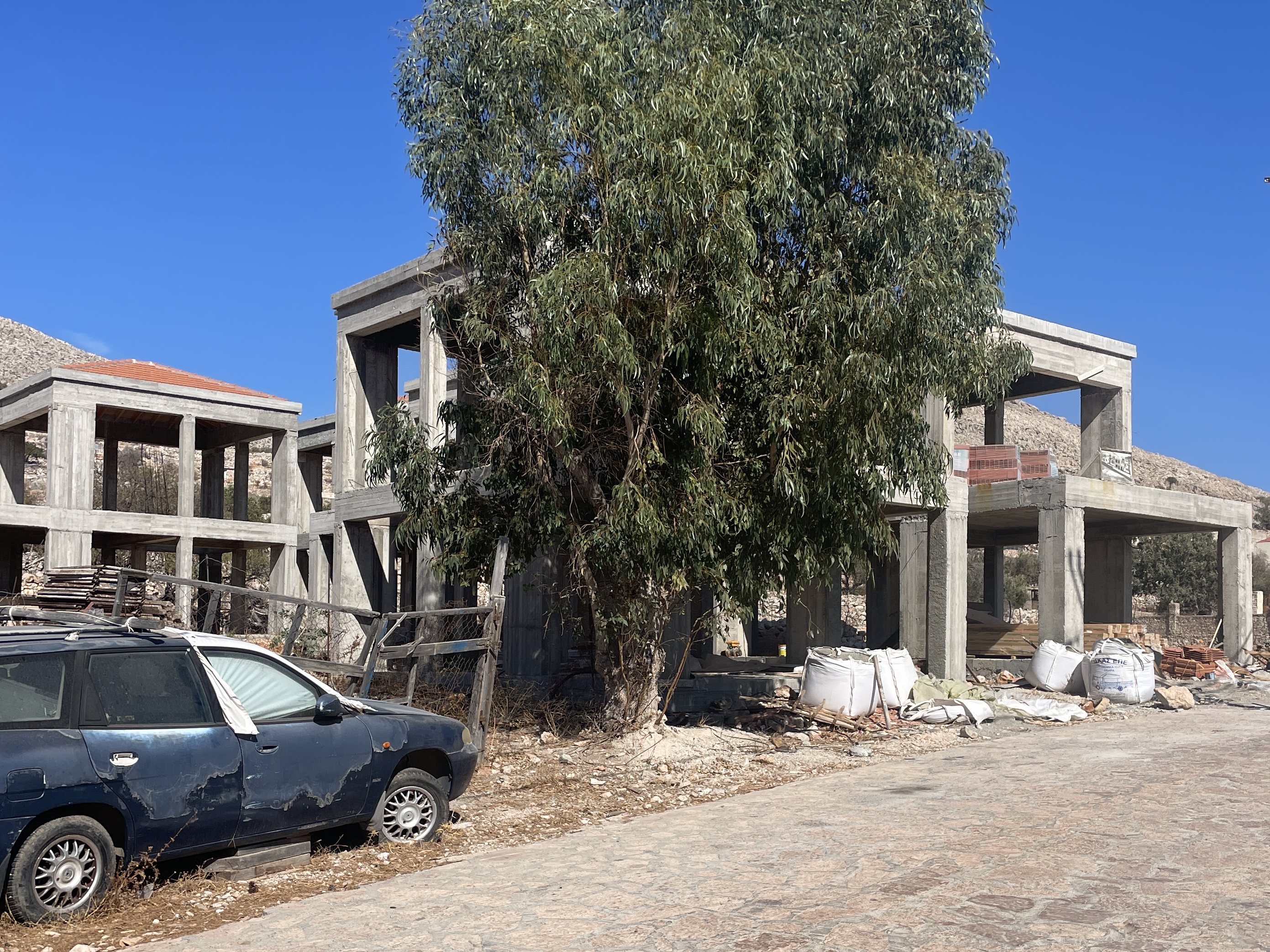 why are there so many empty buildings in Rhodes