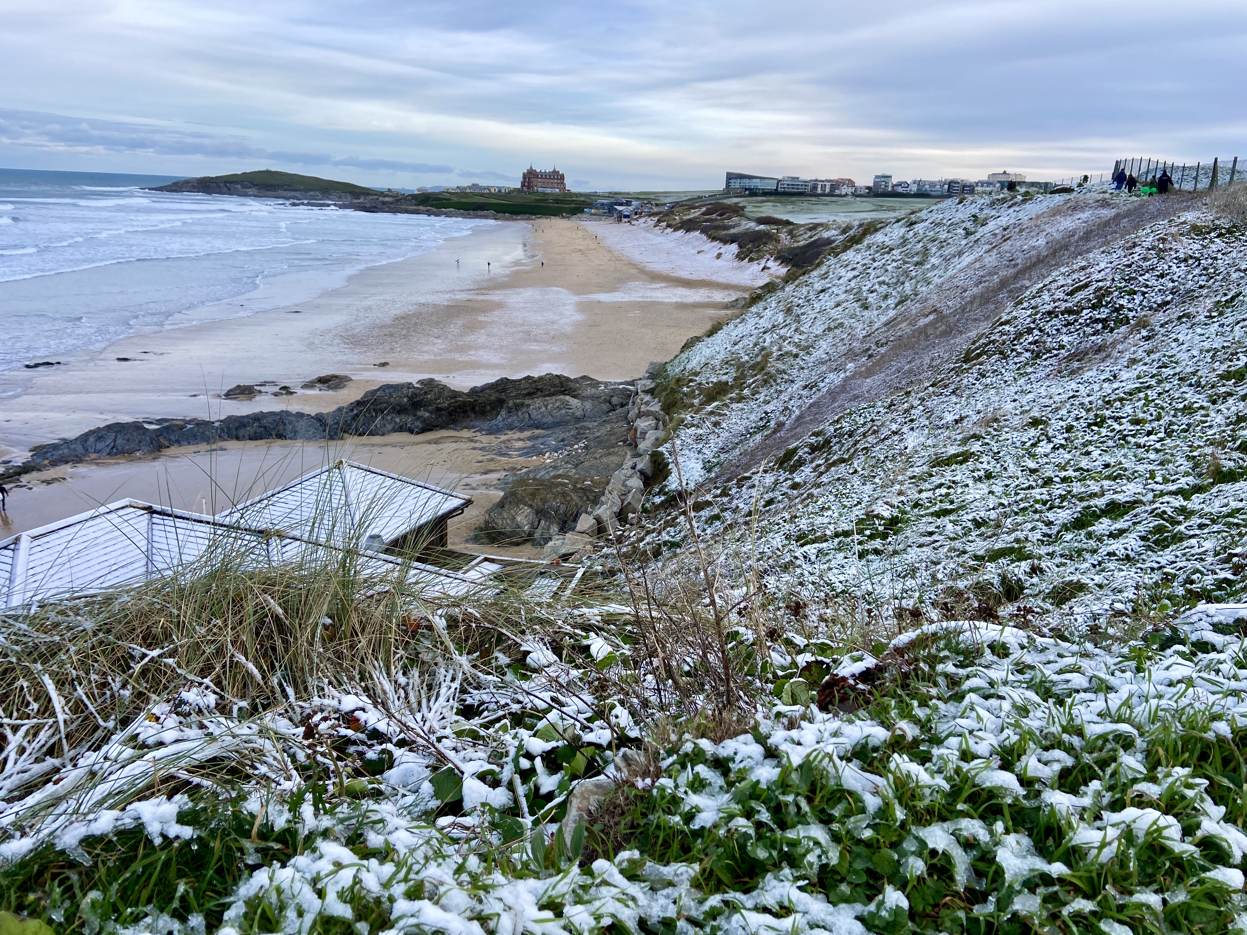 A light sprinkle of snow on Fistral Beach in Newquay