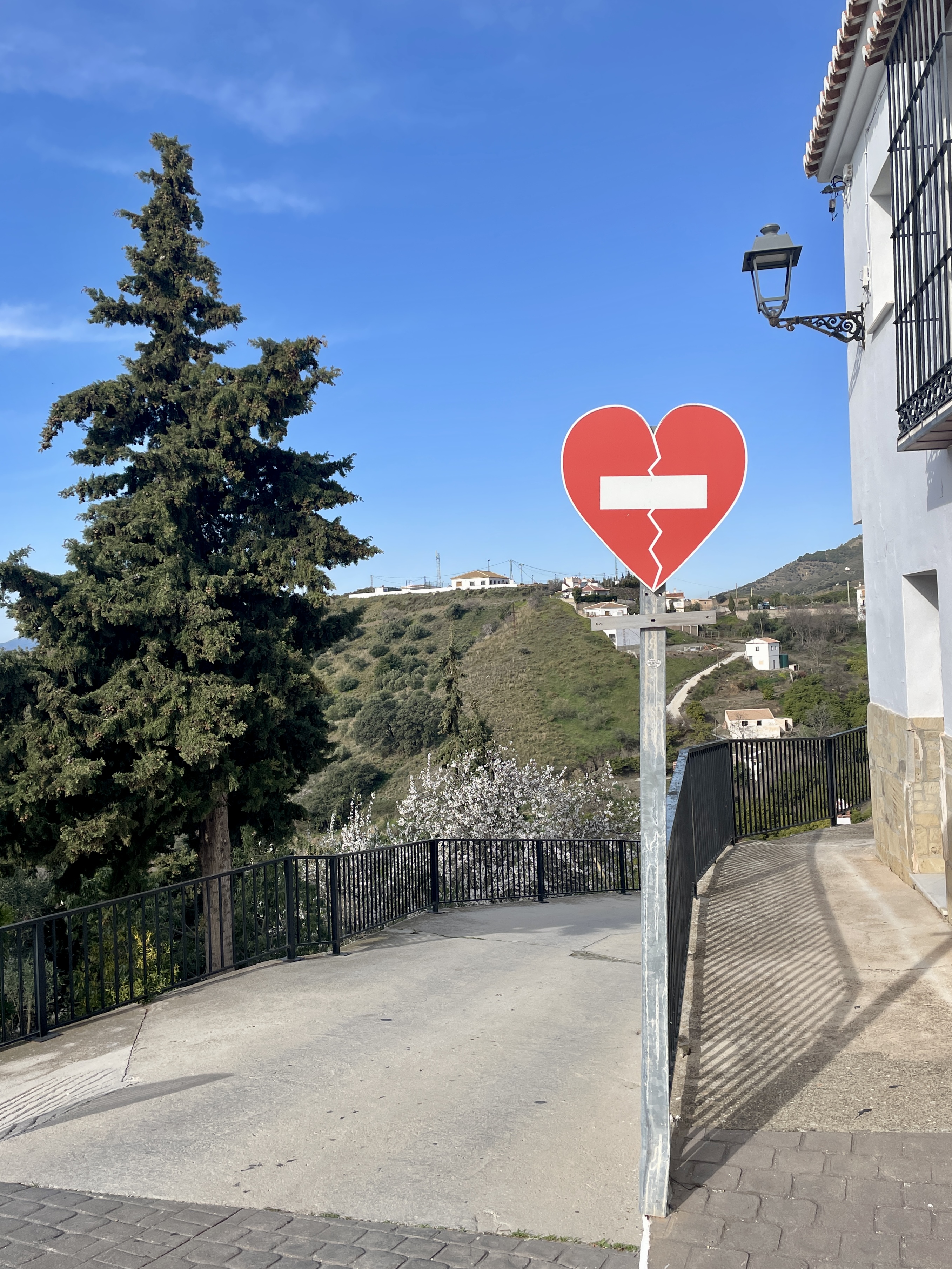 No entry broken heart shaped road sign in Sedella