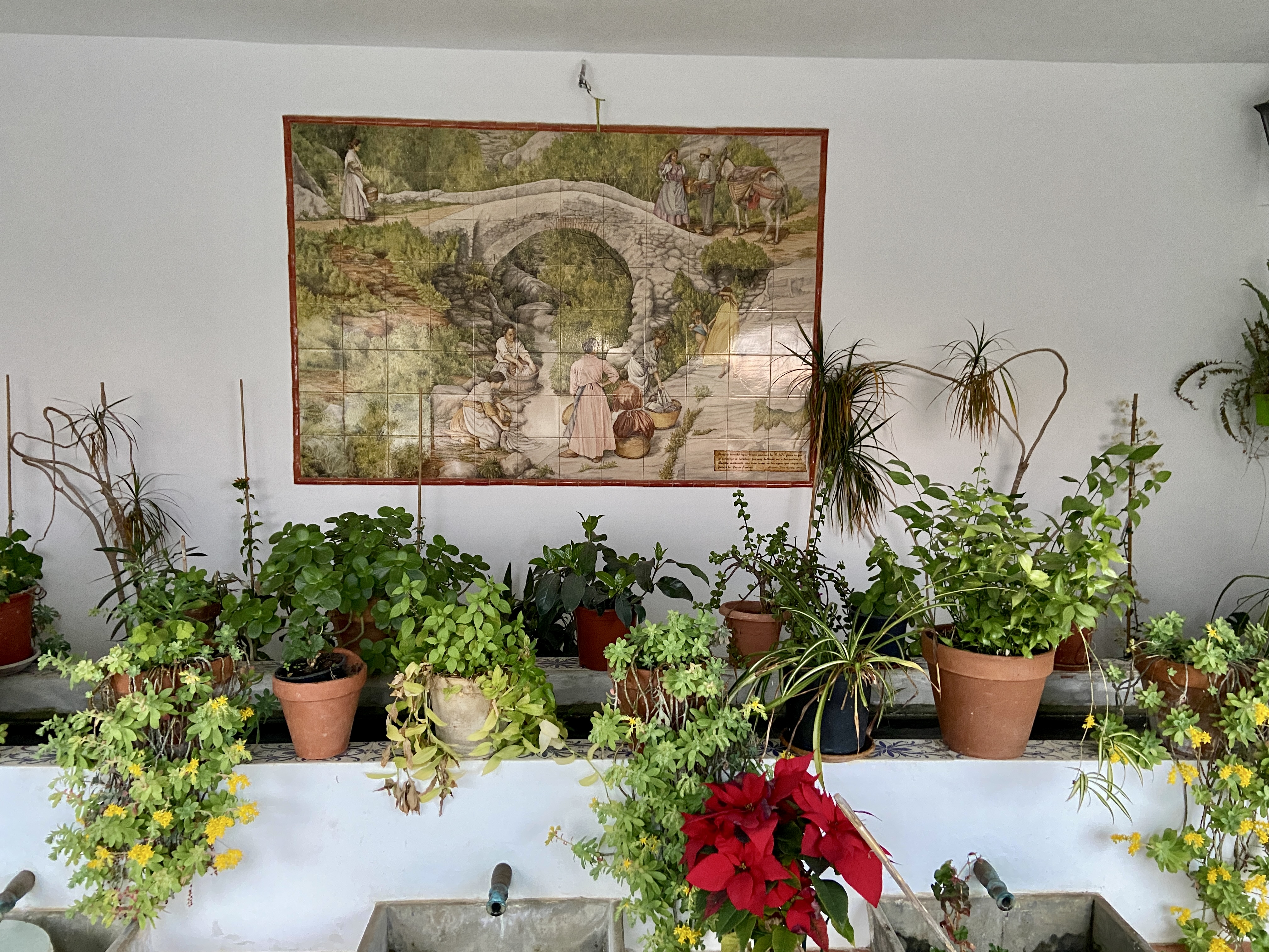 Roman Bridge Puente Arabe Sedella artwork in old launderette