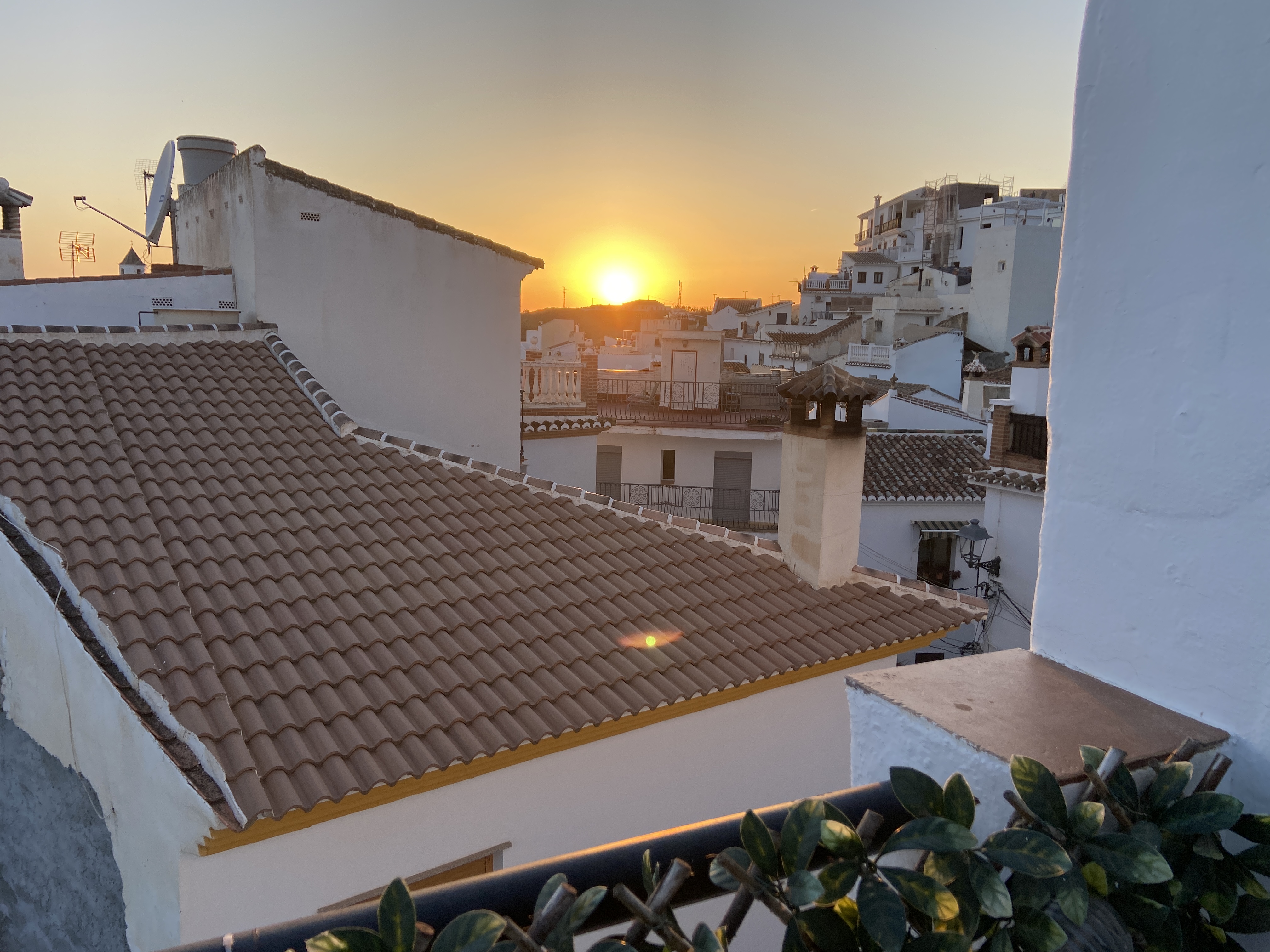 sunset through the rooftops of sedella
