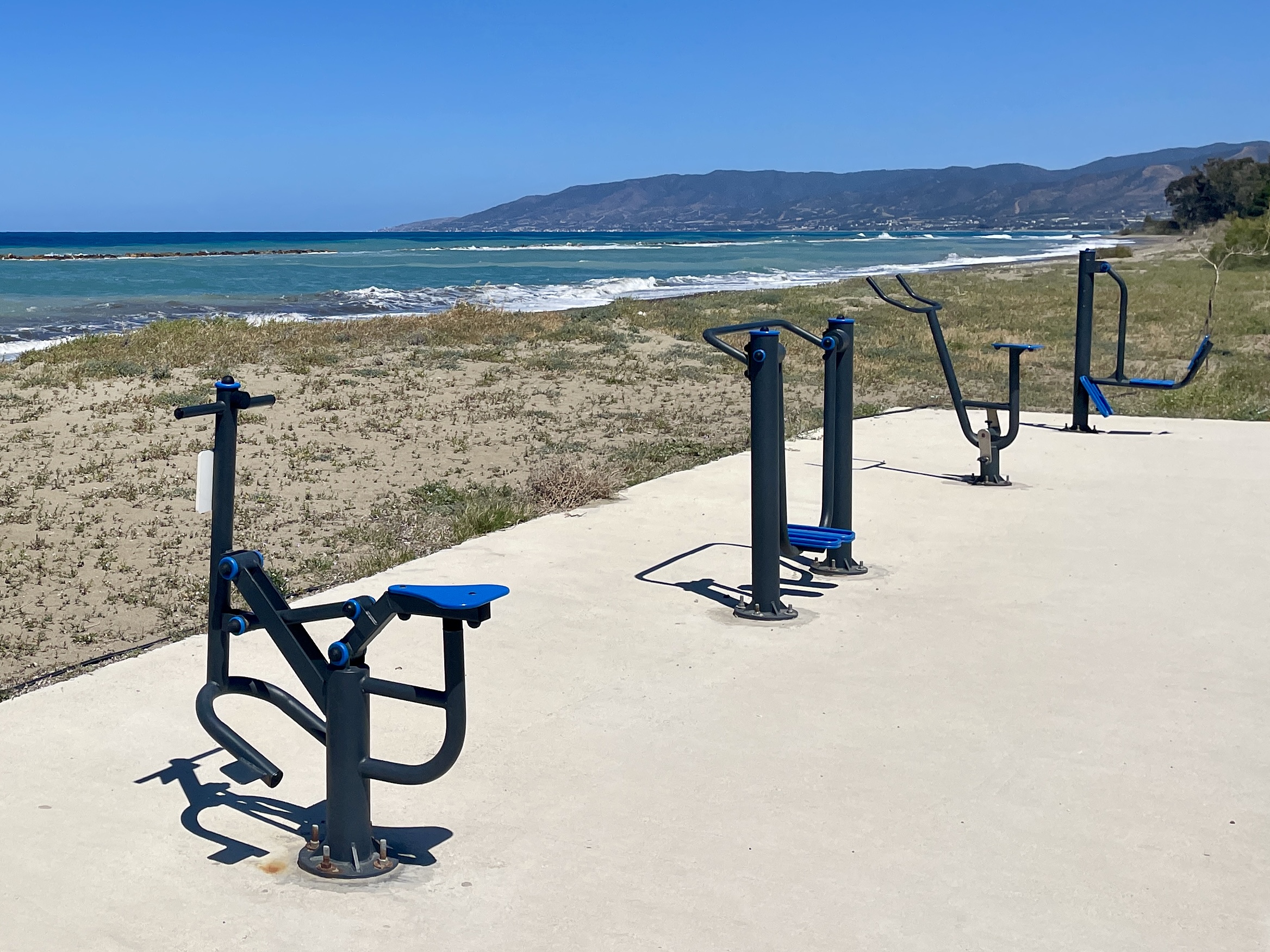 Adult fitness equipment in Latchi with a great seaview