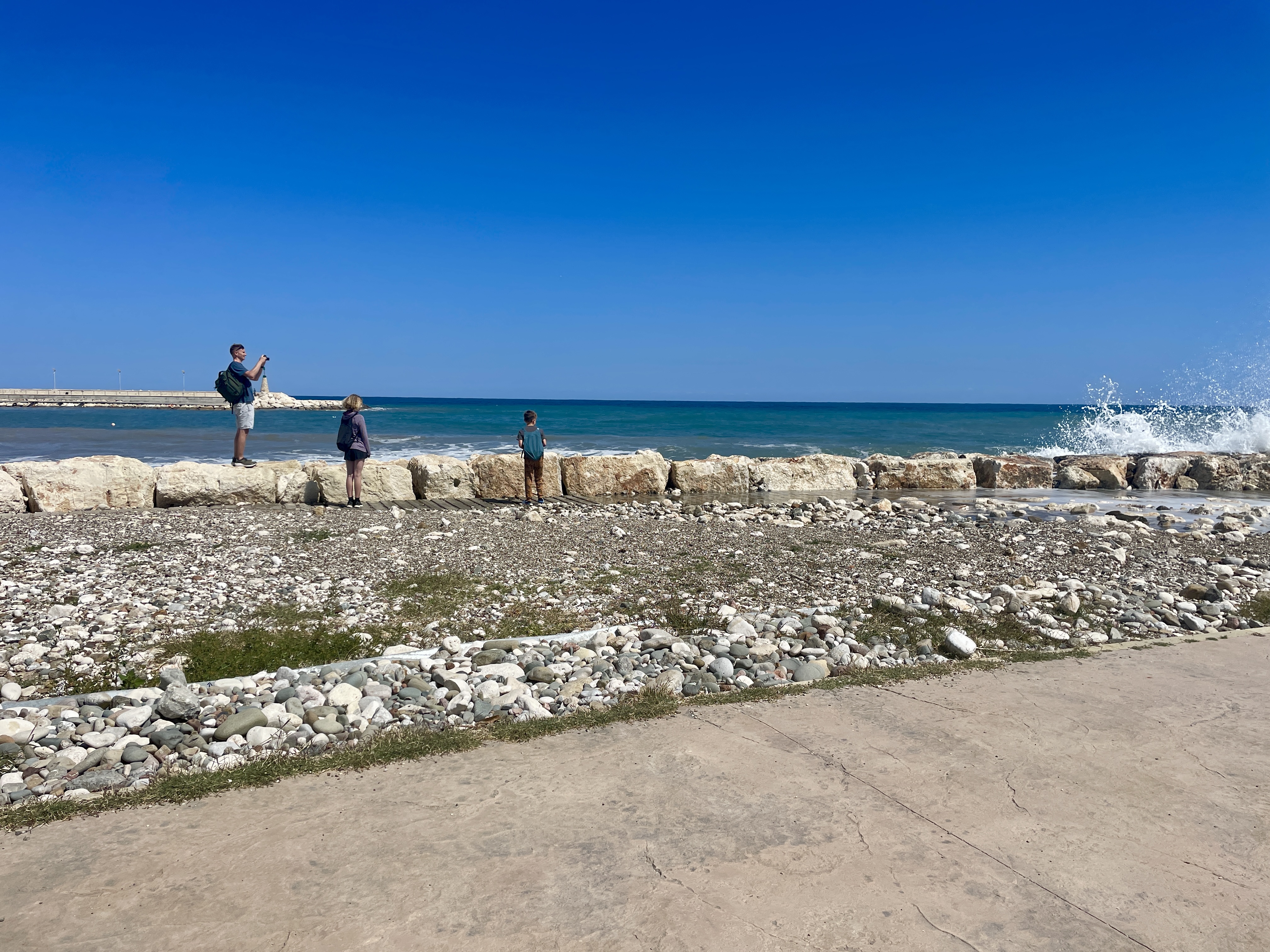 Waves crashing next to the walkways near to Latchi Harbour in Cyprus