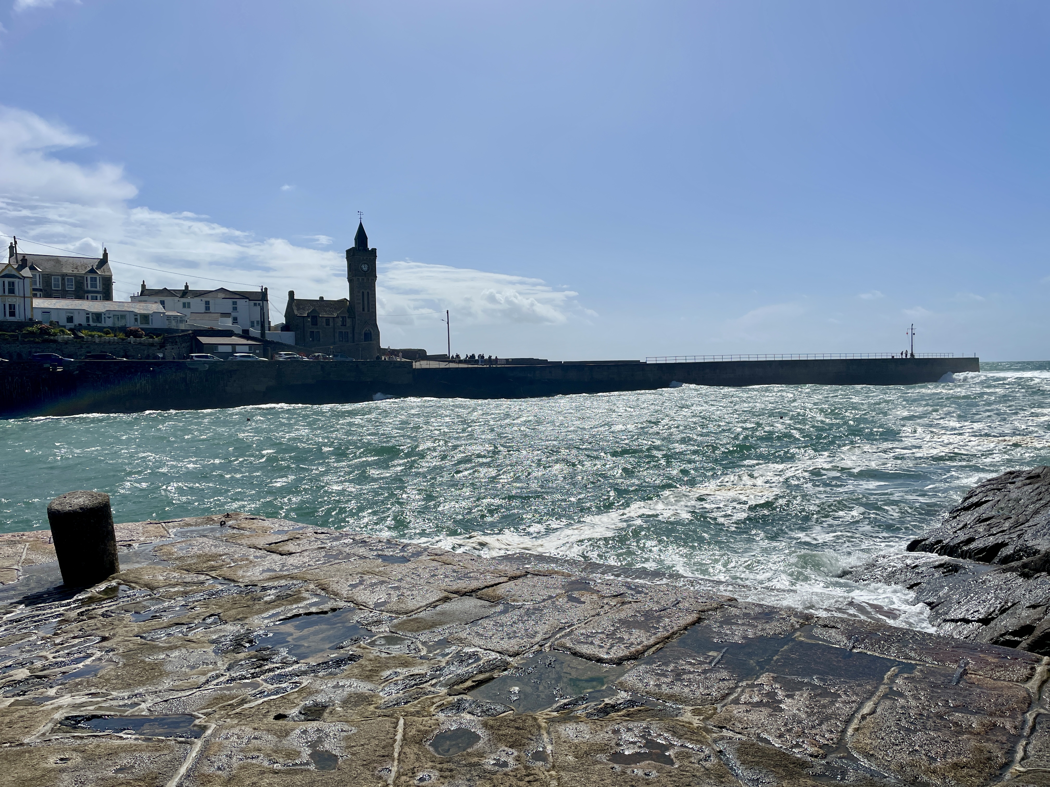 Porthleven Pier Church and pier silhouette in the late August sunshine