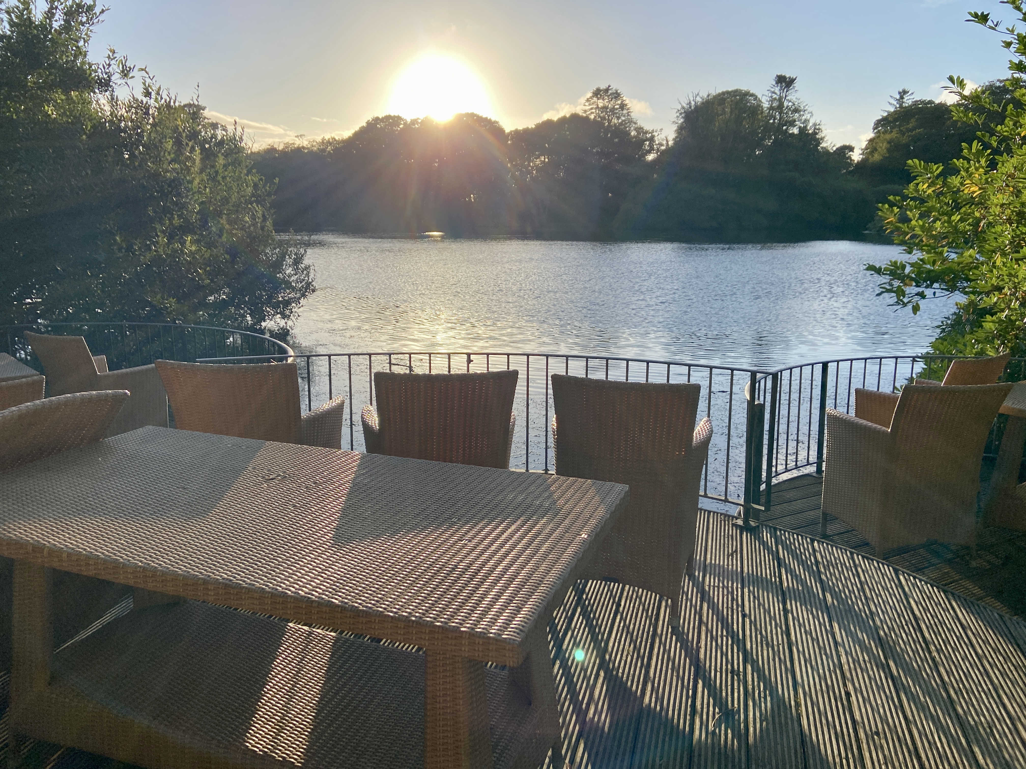 We enjoyed a sunset from this seating at the far end of the lake at Clowance Estate