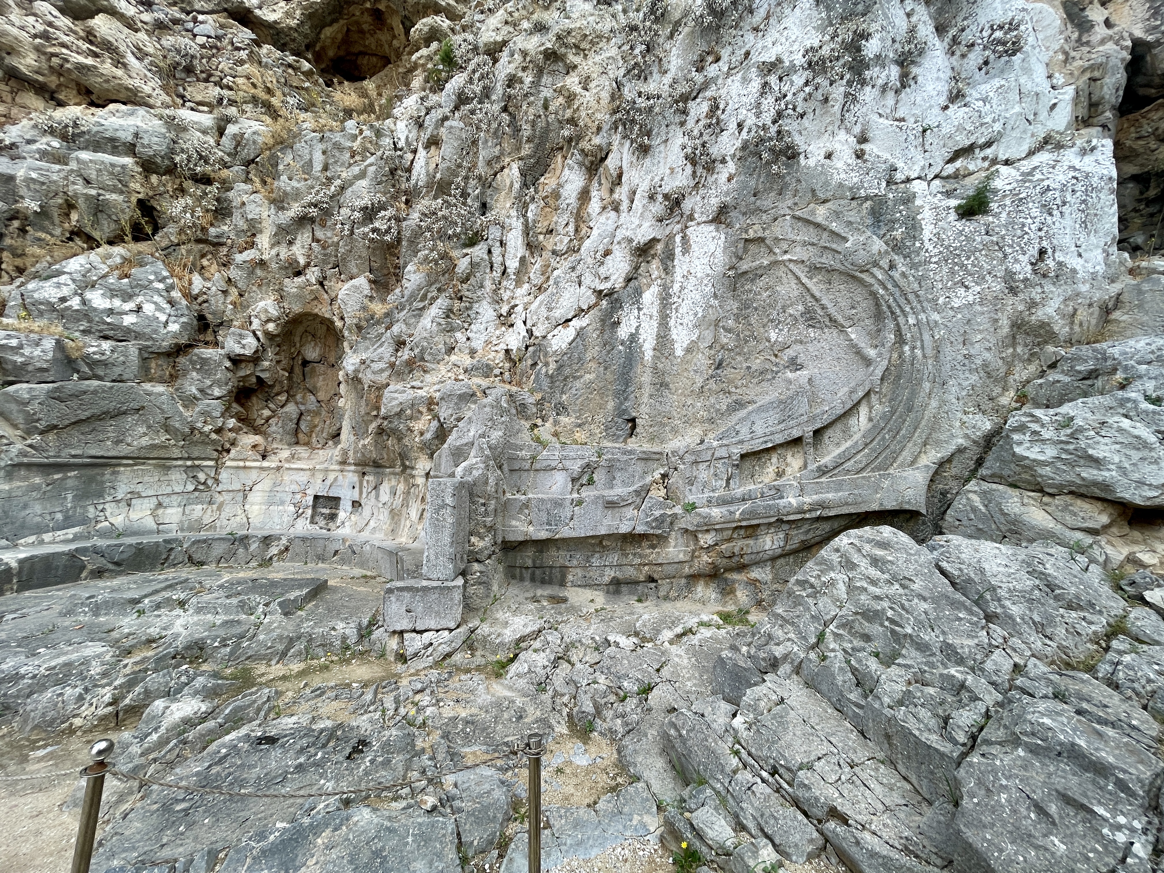 Ancient ship relief carved into rock below the Acropolis of Lindos, Rhodes, depicting a Rhodian warship from around 180 BC.