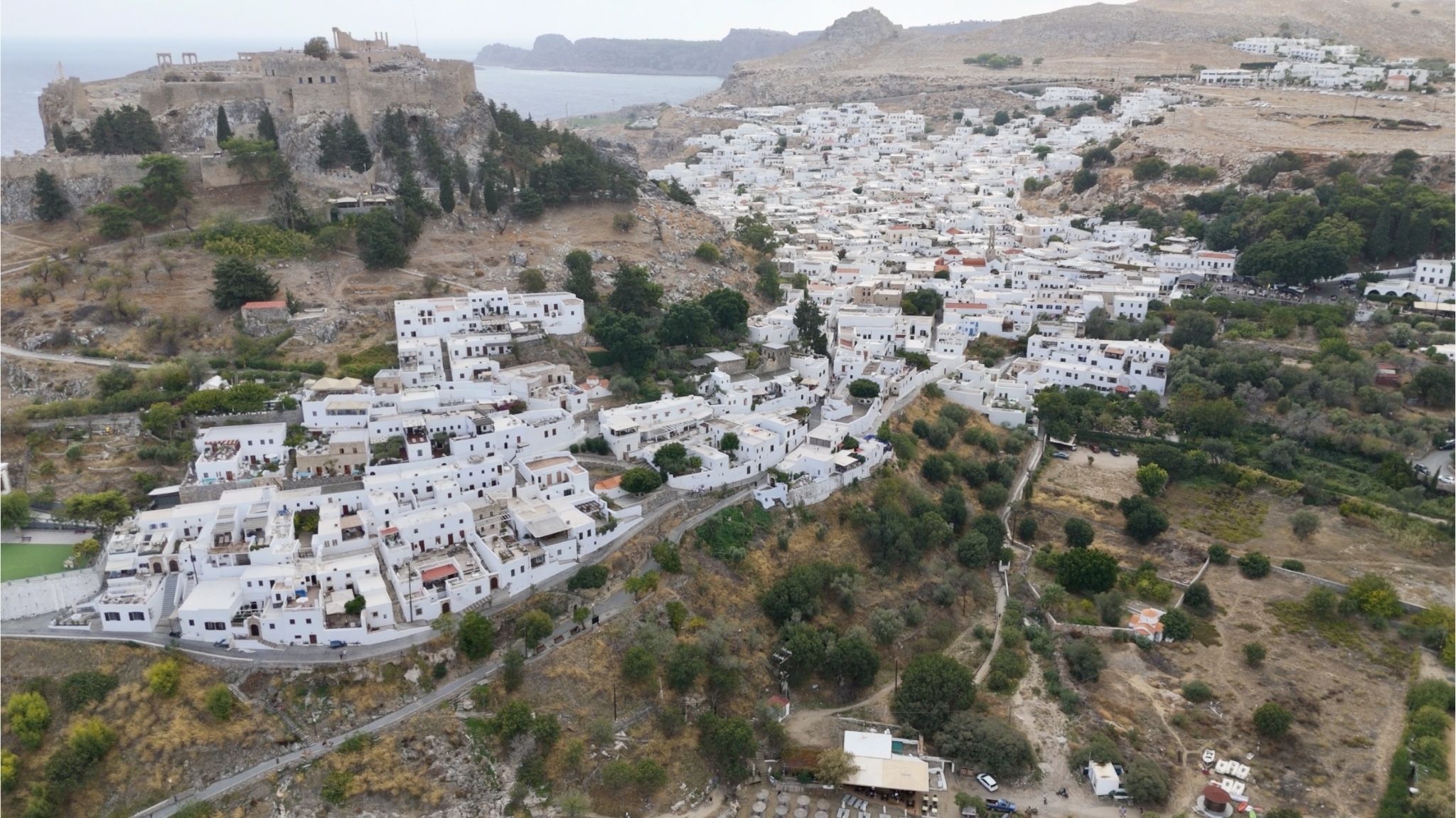 A photo of Lindos village and the Acropolis my husband snapped with his drone on a cloudy day