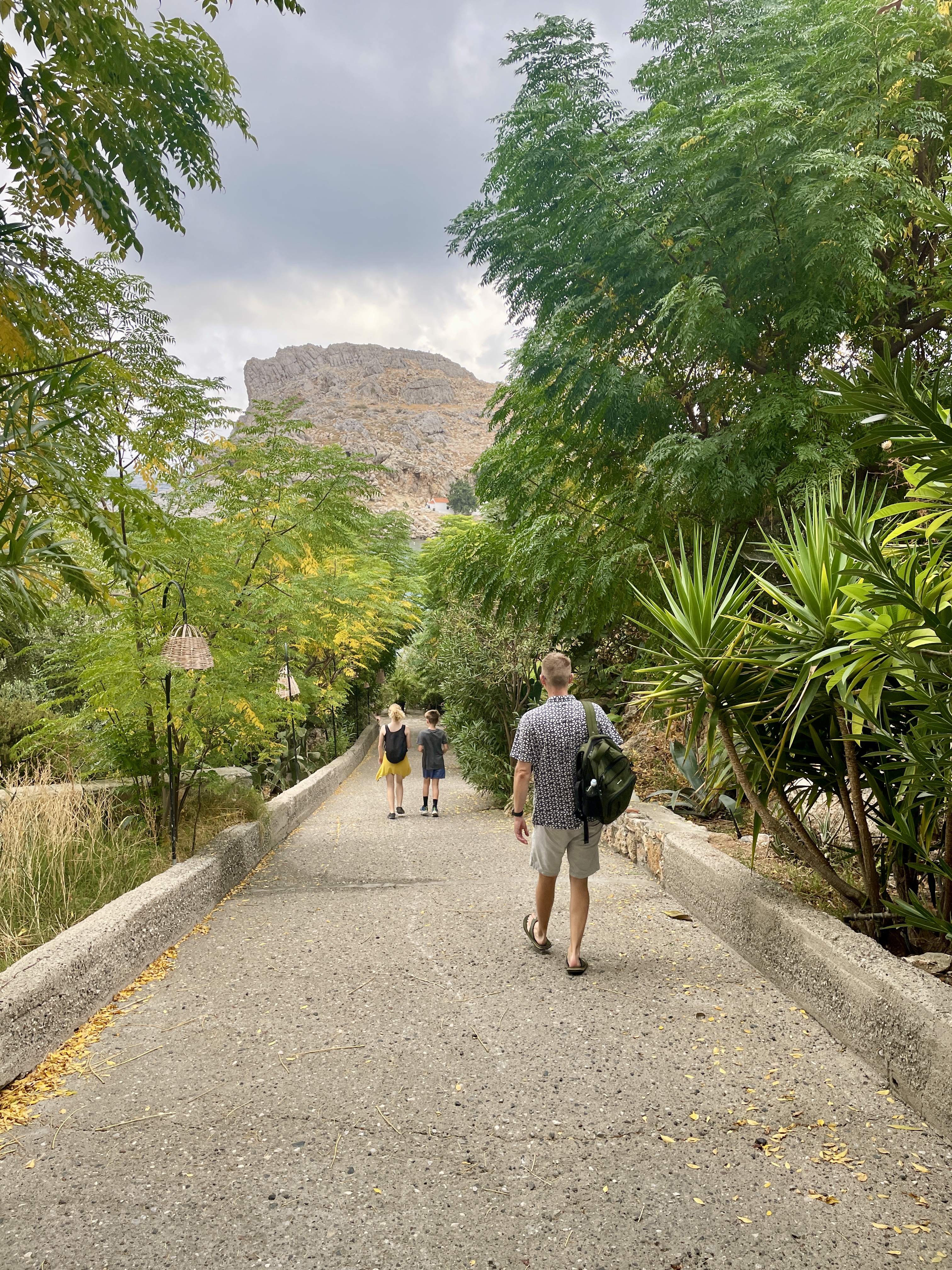 The path down to Mikros Gialos Beach at St Paul's Bay in Lindos has tropical vibes