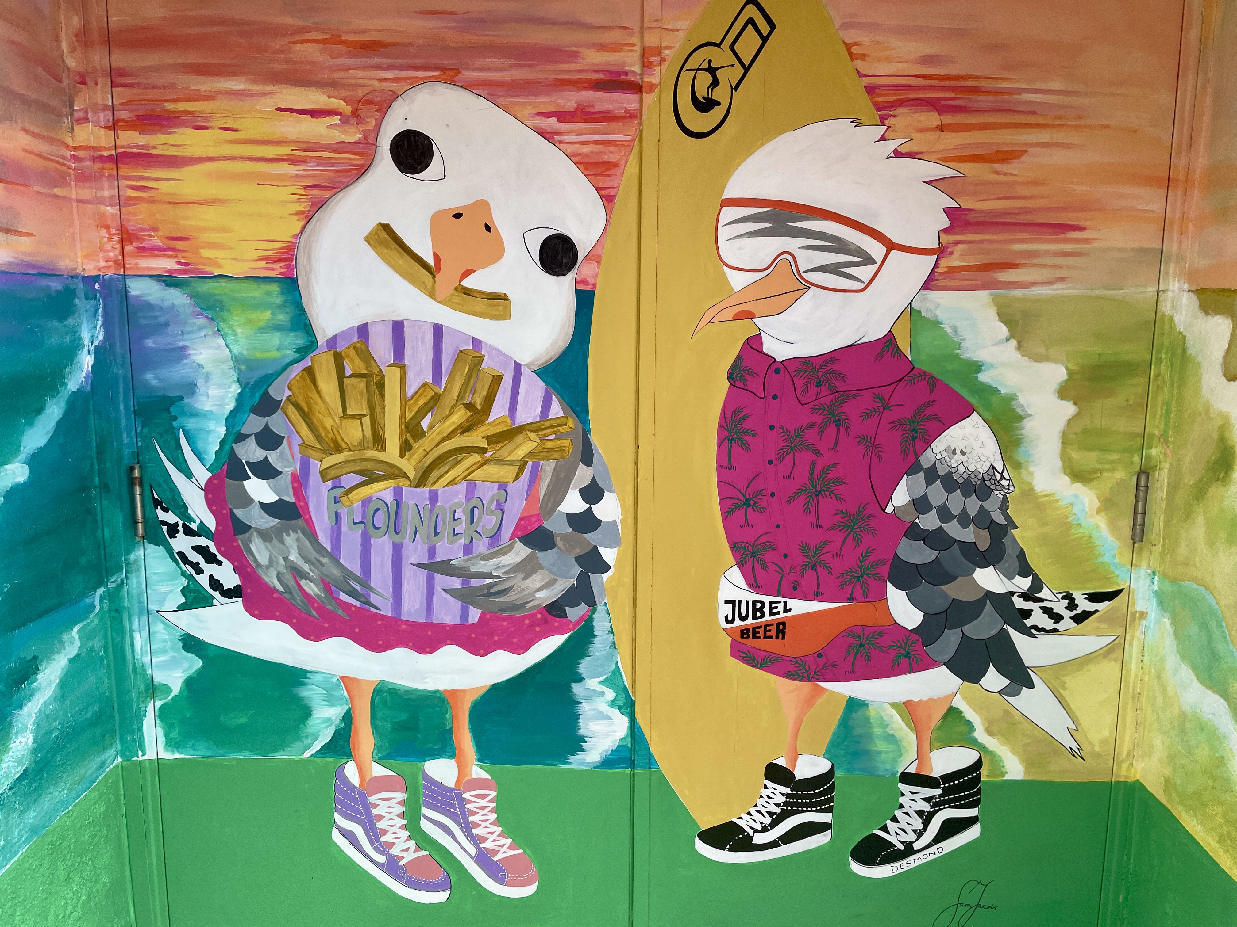 Seagulls on Vans doorway mural by Sara Jacobs beside Concho Lounge on Bank Street in Newquay