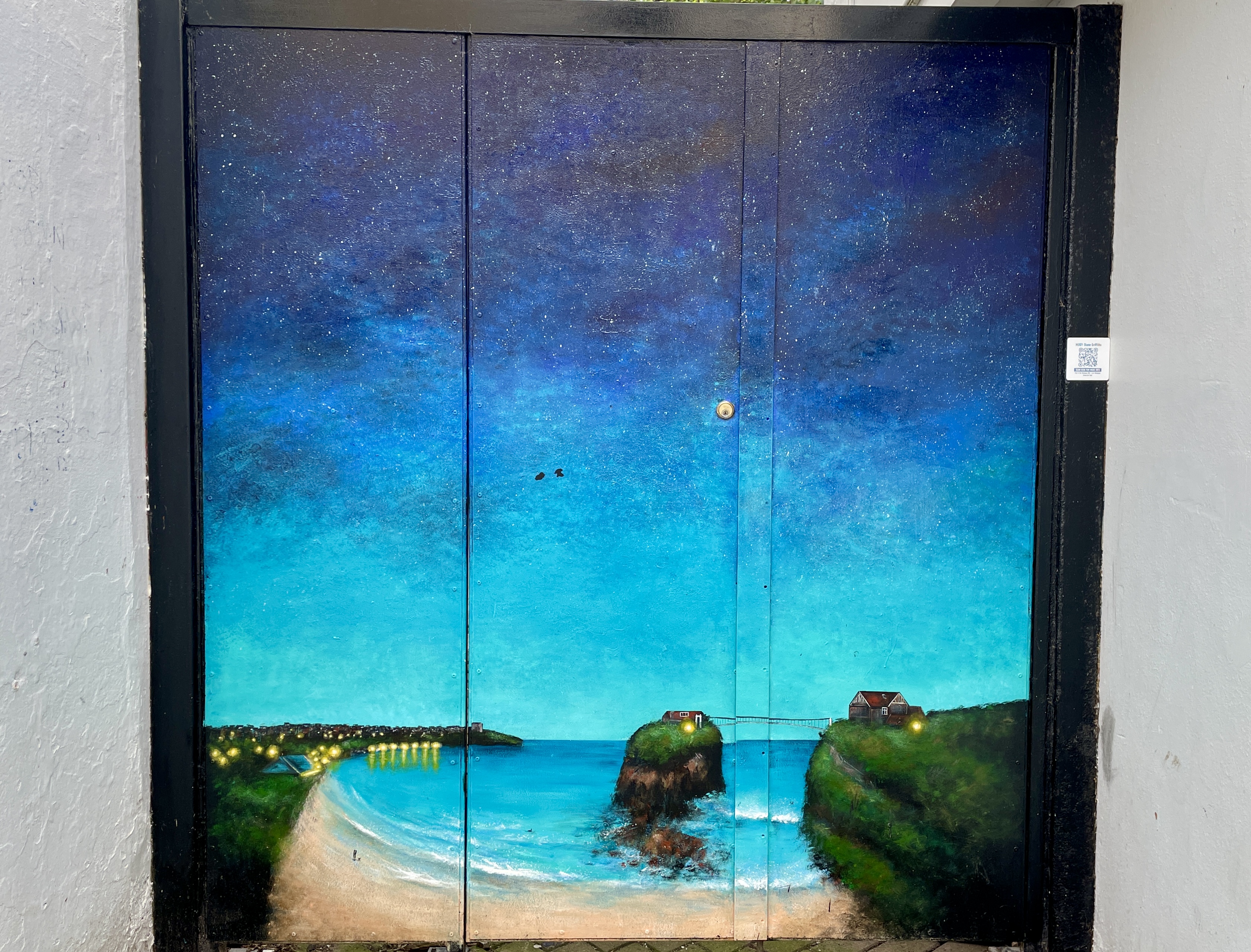The Island After Dark doorway mural by Diane Griffiths at the EE Store on Bank Street in Newquay