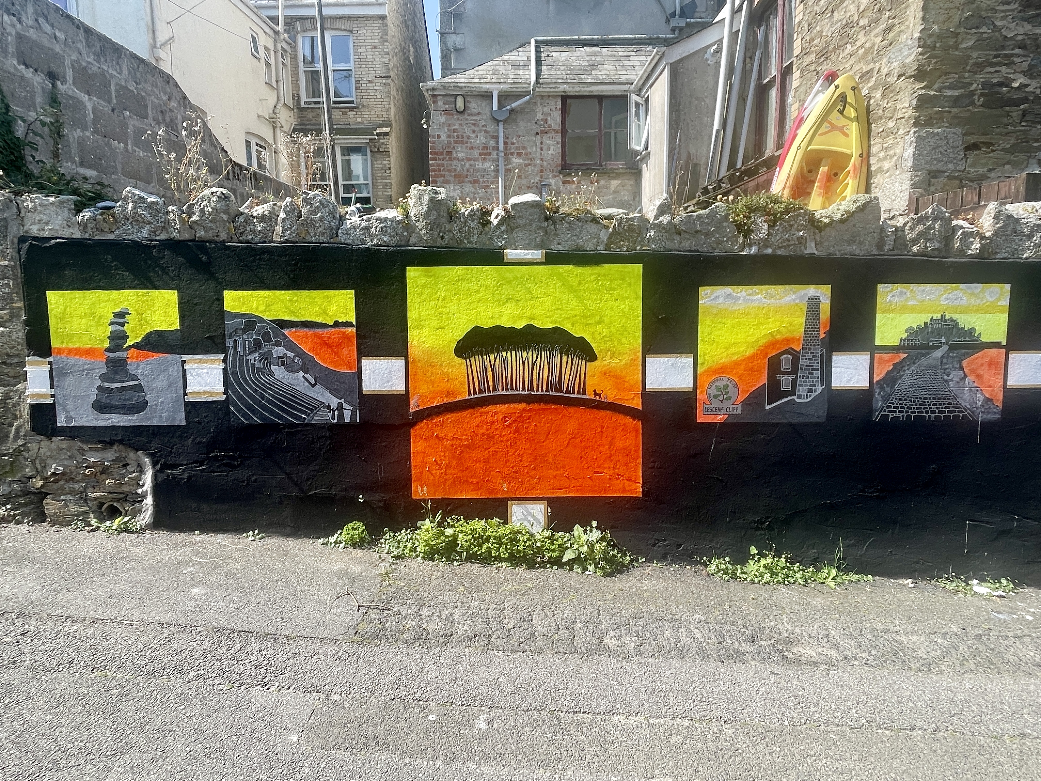 Cornish Landmarks Silhouette Mural on Crescent Lane in Newquay featuring the Minack Theatre, Cookworthy Knapp, Lescave Cliff and St Michael's Mount